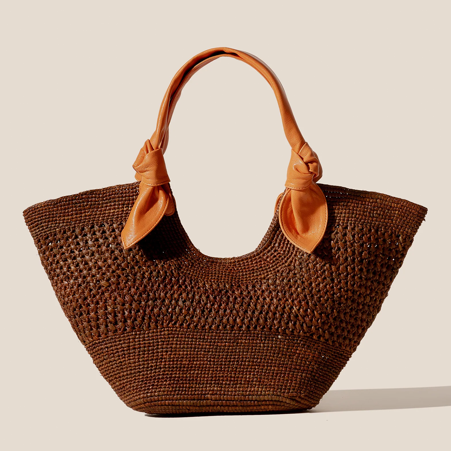 Deep Umber Brown Hand Crocheted Fan Shaped Woven Tote With Vibrant Tangerine Knotted Accent Shoulder Grip Straps