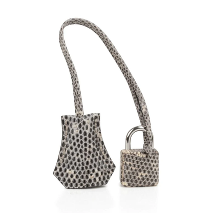Gradient Ombre Neutral Scaled Textured Compact Trapezoid Hand Tote With Polished Silvery Twist Lock Hardware And Matching Patterned Suspended Metal Padlock Charm
