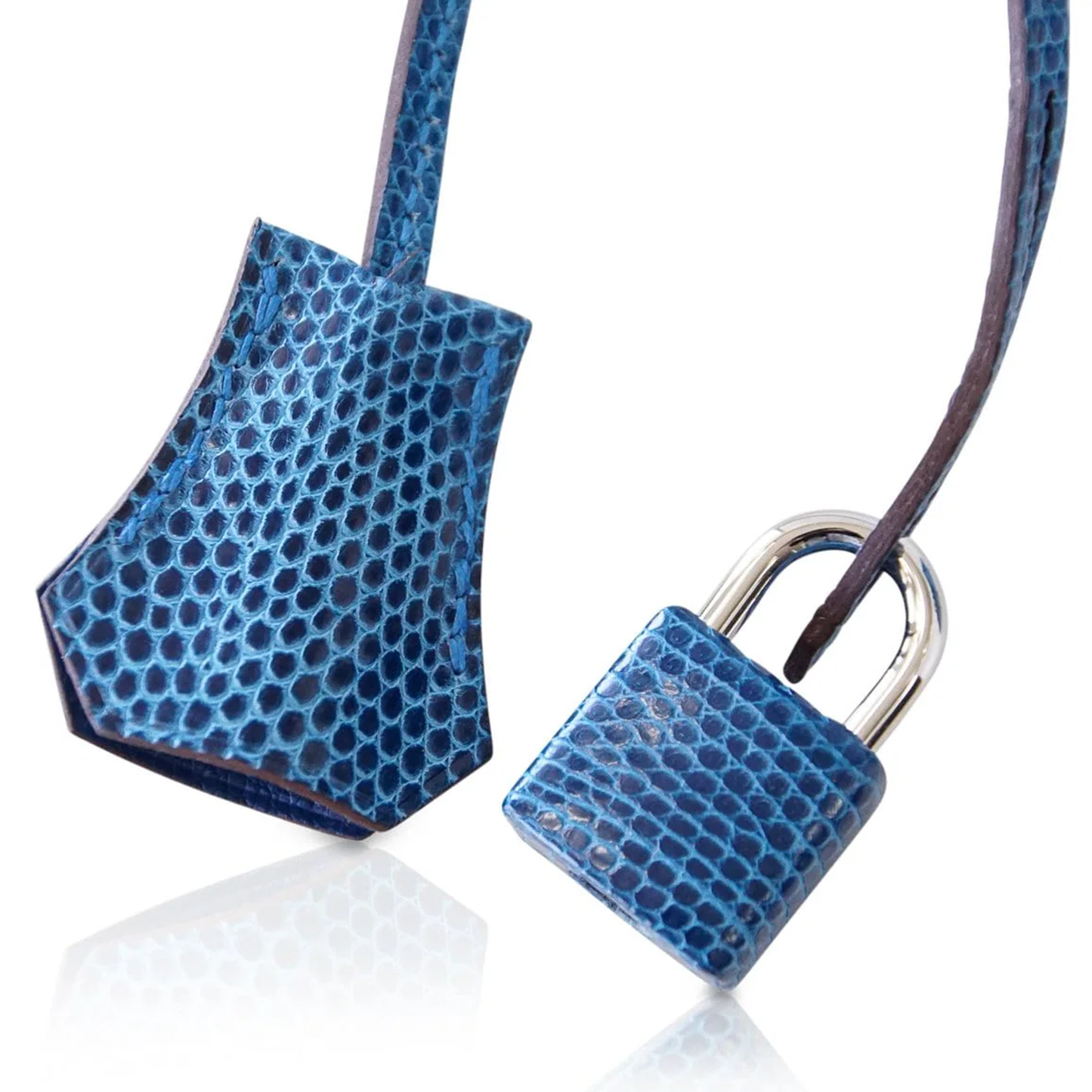 Vivid Mediterranean Blue Fine Scaled Compact Structured Trapezoid Hand Tote With Sleek Cool Silvery Twist Lock Hardware And Matching Patterned Suspended Padlock Charm